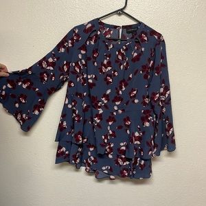 Peekaboo collar blue ruffled floral blouse with bell sleeves EUC
